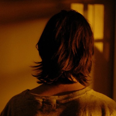 behind
